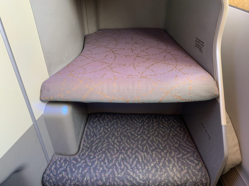 a seat in a small room