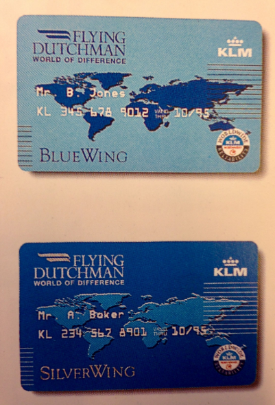 a blue credit card with a map of the world