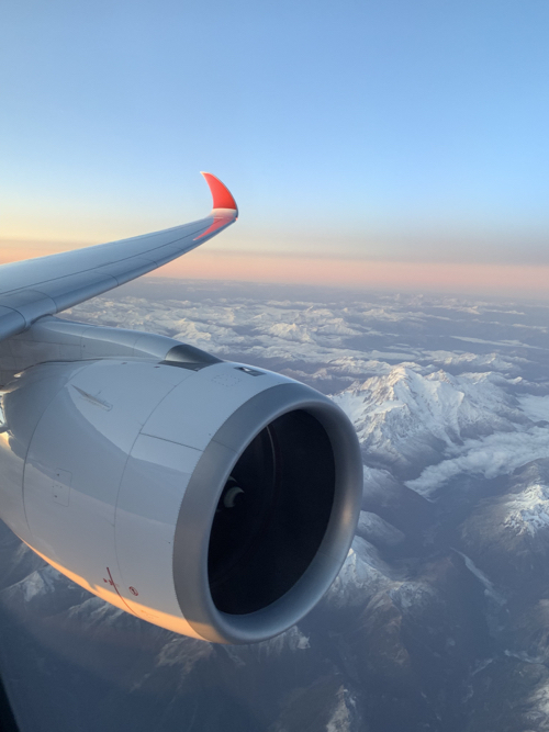 an airplane wing and the sky