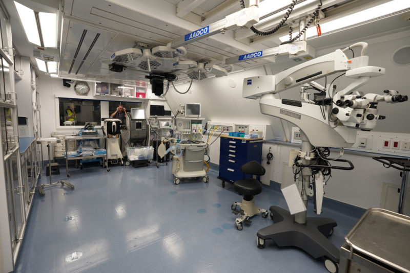 a room with a microscope and medical equipment
