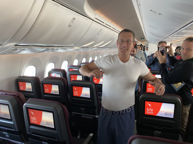 a man standing in an airplane