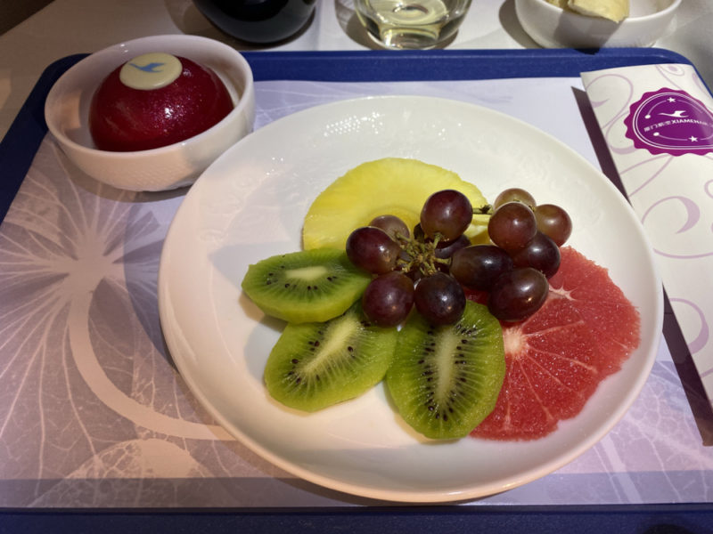 a plate of fruit on a tray