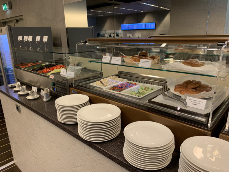 a buffet with plates and food