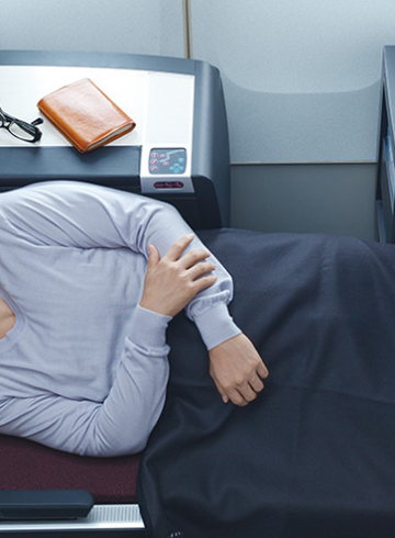 a man sleeping on a bed