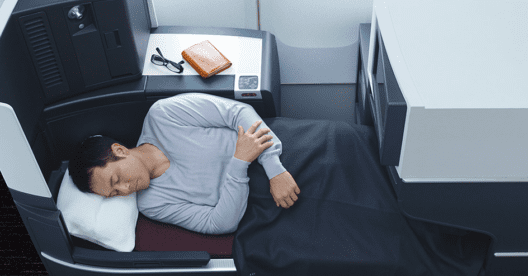 a man sleeping on a bed