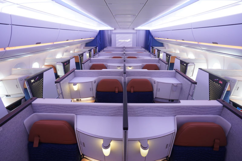 an airplane with seats and desks