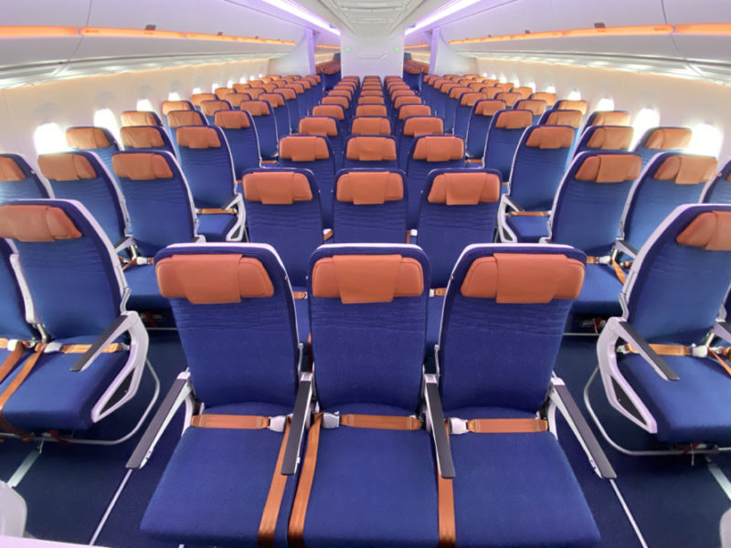rows of blue and orange seats