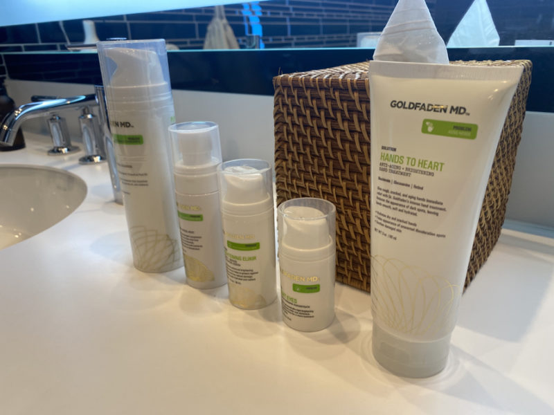 a group of white bottles on a counter