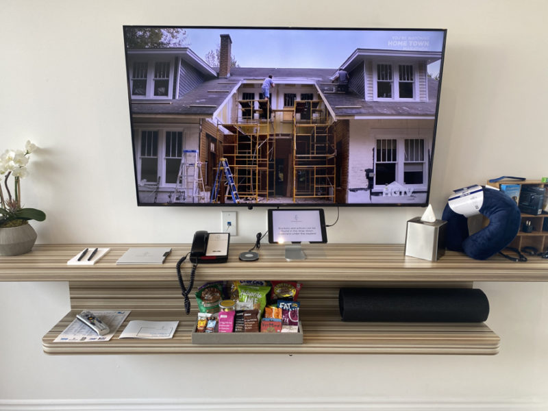 a television on a shelf