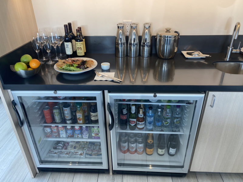 a refrigerator with food and drinks on it