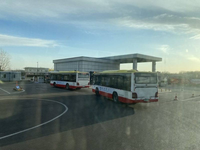 buses parked in a parking lot