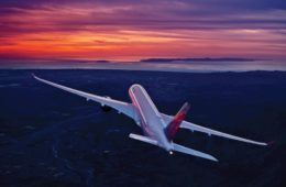 an airplane flying over land