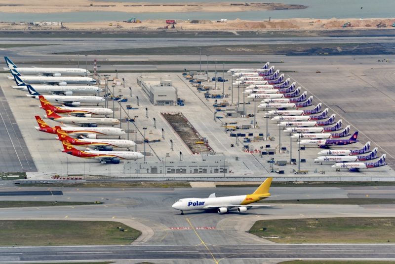 an airport with airplanes parked on the ground