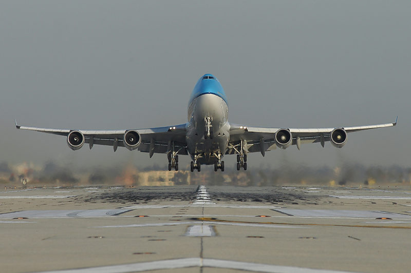 a plane taking off from the runway