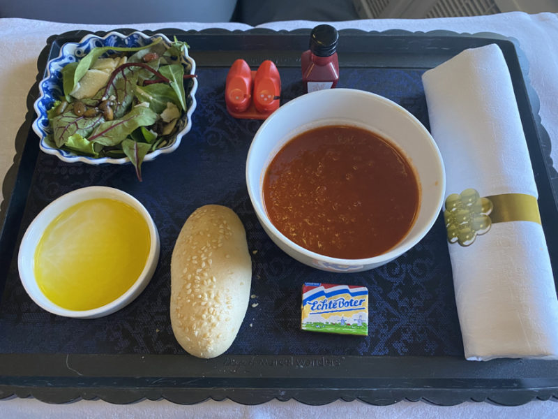 a tray with food and a bowl of soup