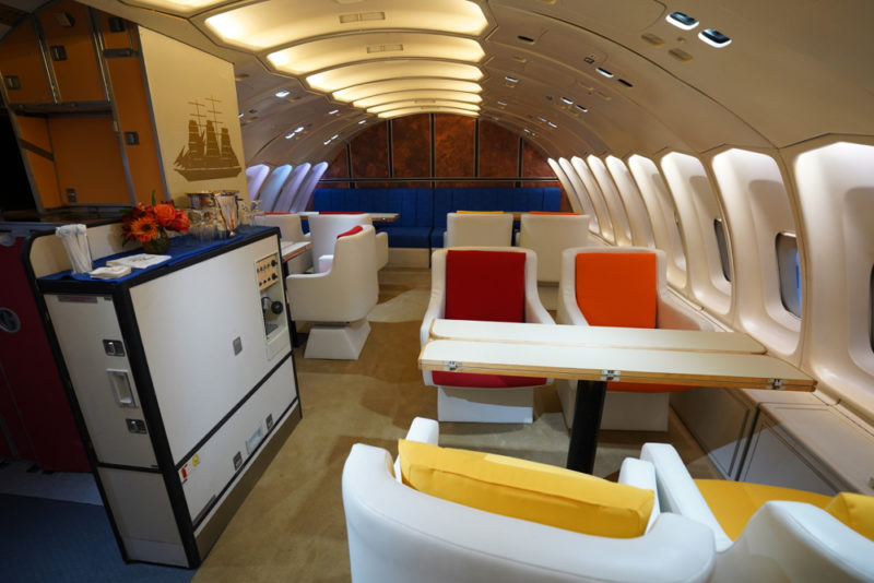 a plane with a table and chairs