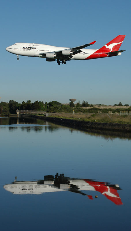 a plane flying over water