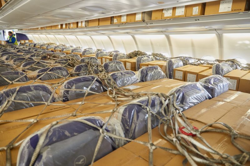 a bunch of boxes tied to a plane