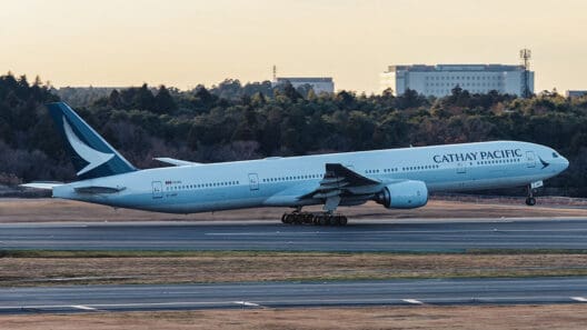 a large white airplane on a runway