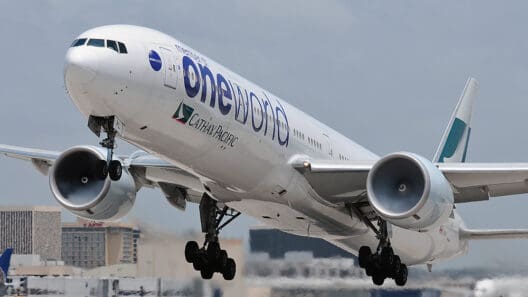 a large white airplane taking off