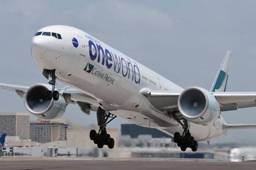 a large white airplane taking off