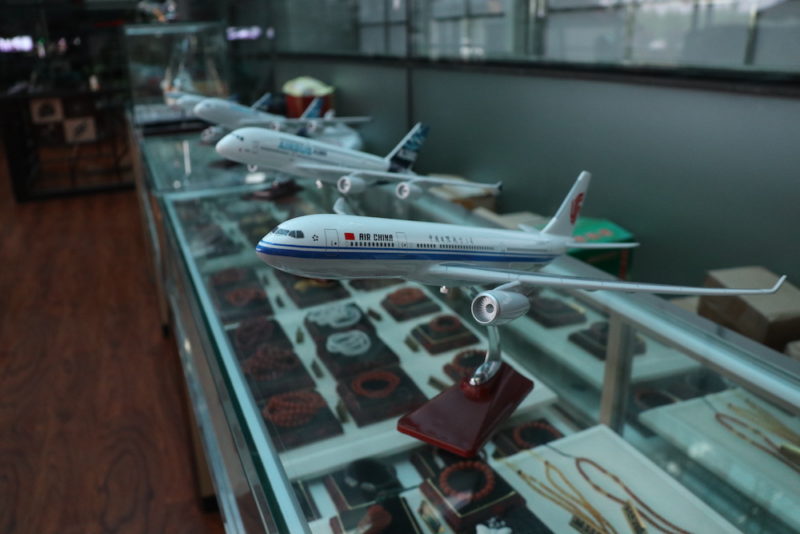 a group of model airplanes on display