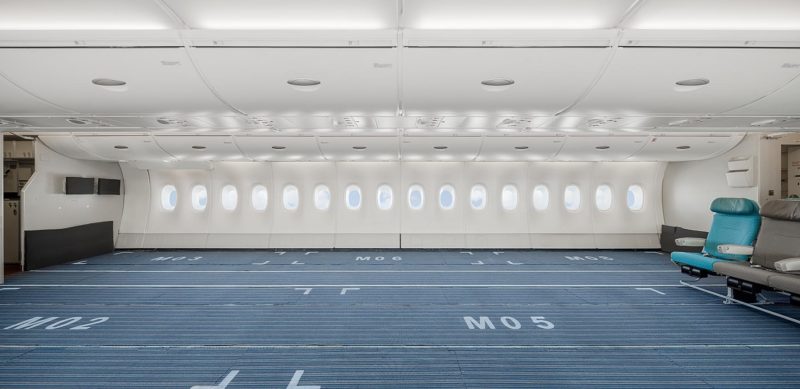 an empty airport with windows