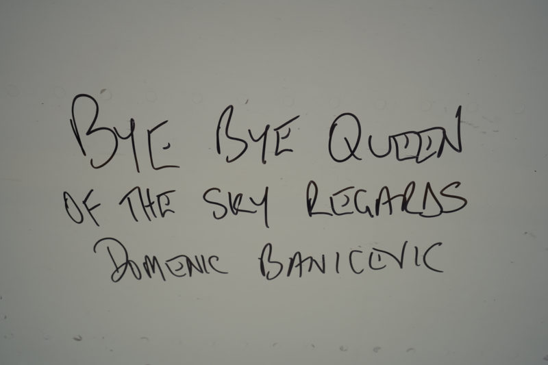 a white board with black writing