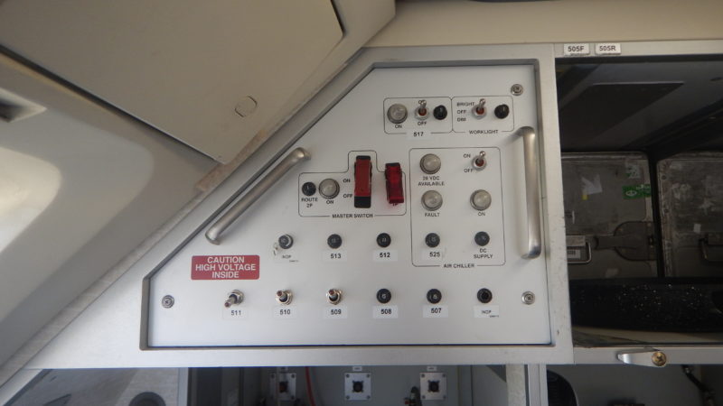 a control panel with buttons and switches