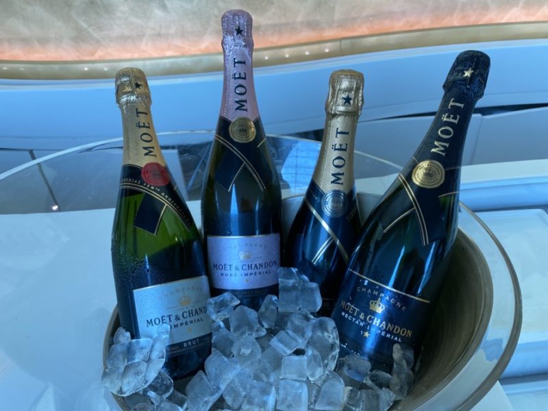 a group of bottles of champagne in a bucket of ice