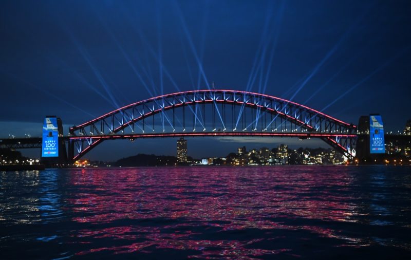 a bridge lit up at night