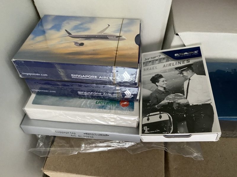 a group of boxes with a picture of an airplane and a picture of a plane