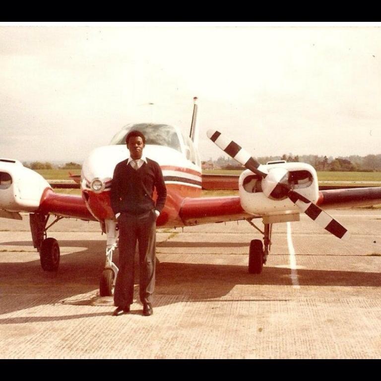 Captain Obet with Beech Baron in flying college