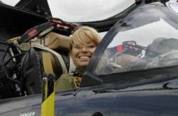 a woman in a pilot's seat