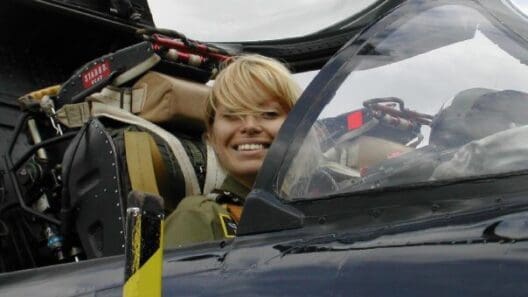 a woman in a pilot's seat