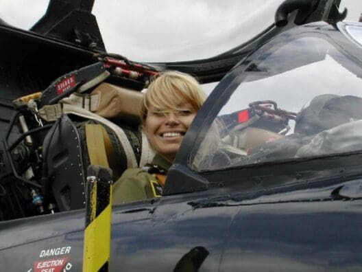 a woman in a pilot's seat