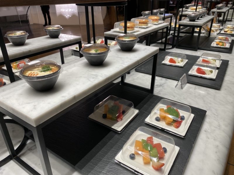 a group of plates of food on a table