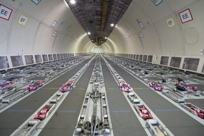 a long tunnel with wheels on the track