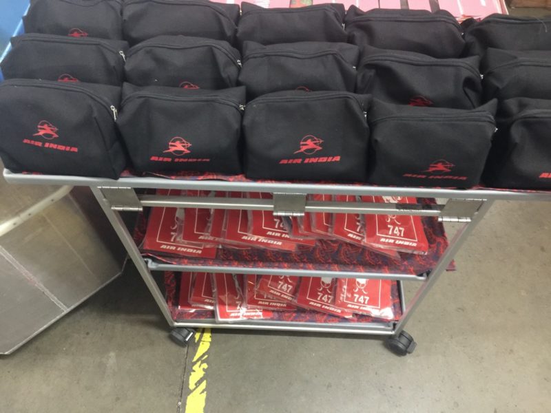 a rack of black bags