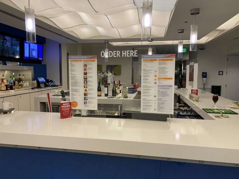 a counter with a menu in it