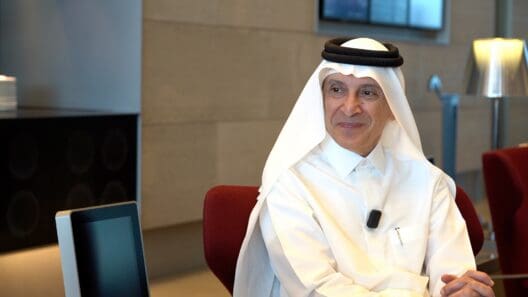 a man in a white shirt and headdress