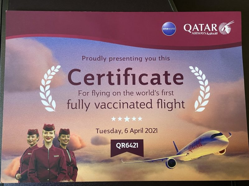 a certificate with a picture of a plane and people