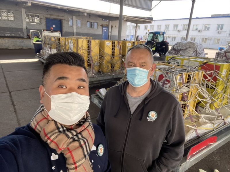 two men wearing face masks