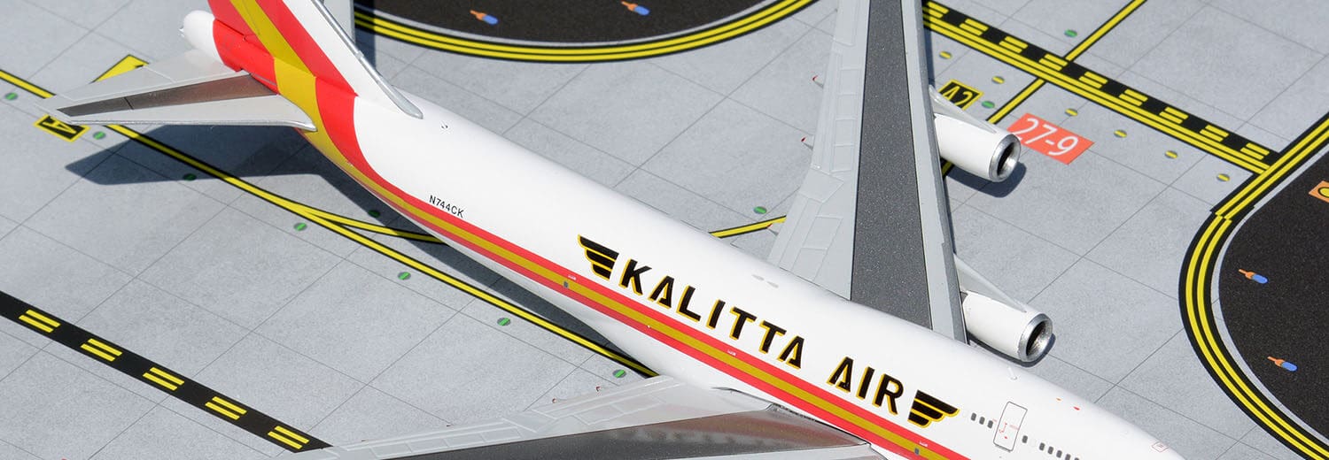 a model airplane on a runway