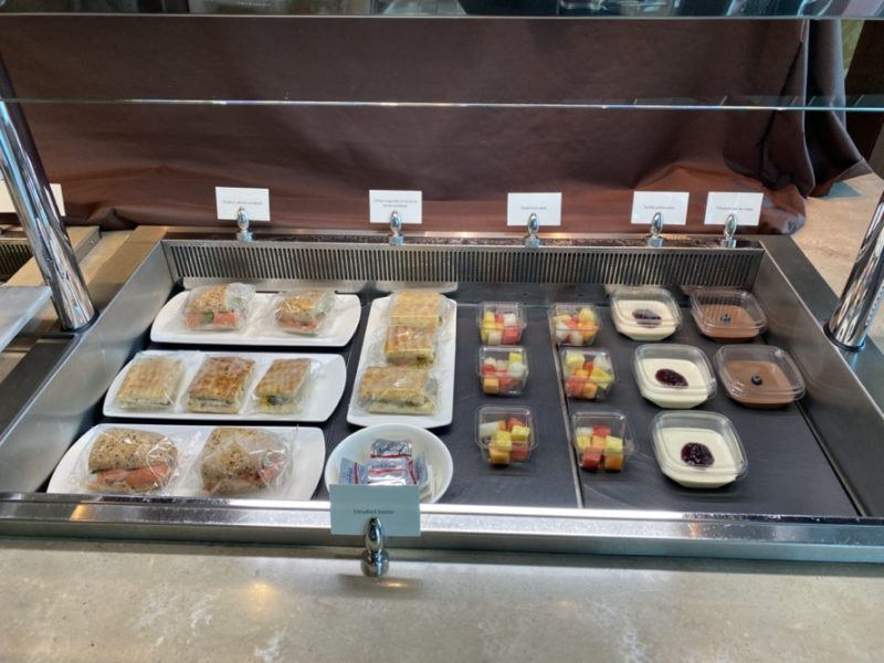 a tray of food in plastic wrap