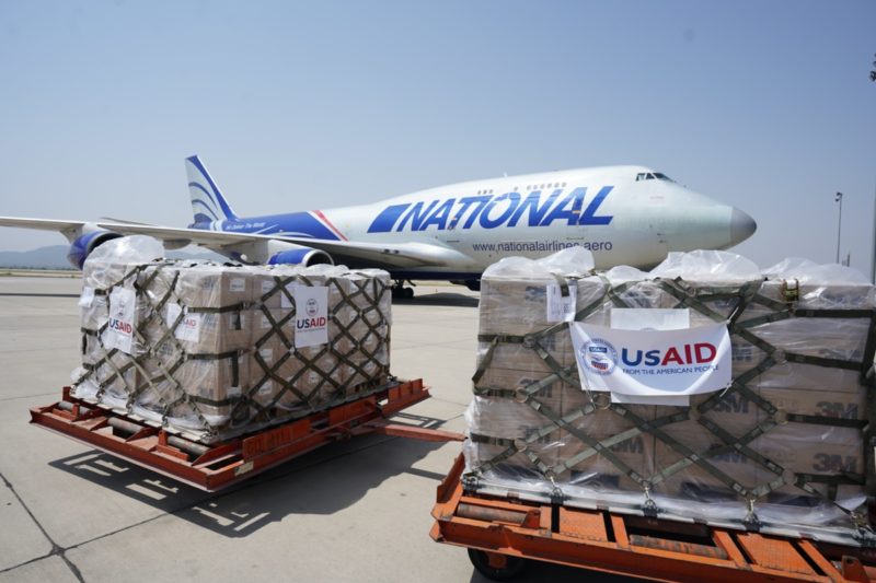 a plane with pallets of goods