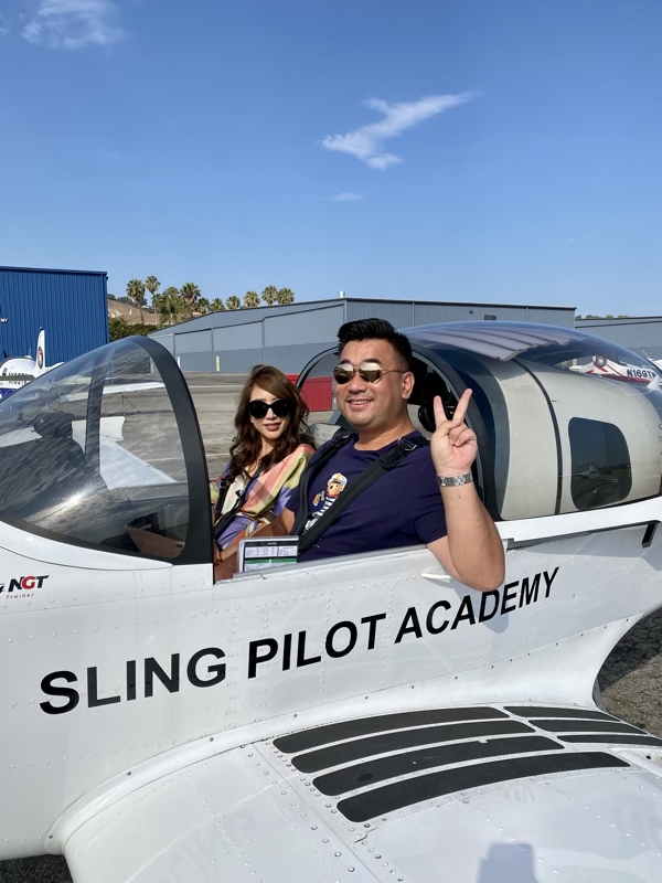 a man and woman in a plane