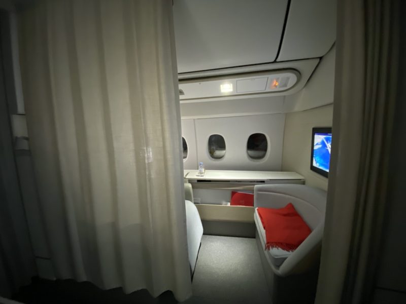 a white curtain in a plane