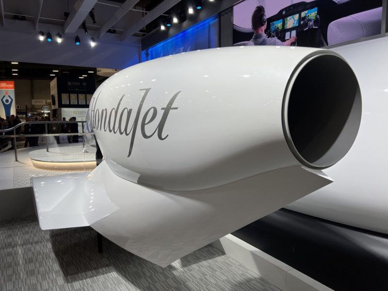 a white jet engine in a room