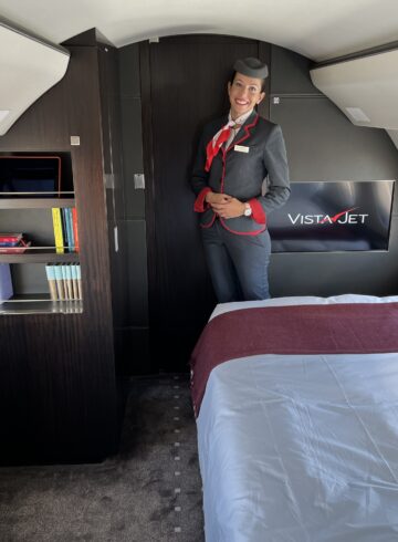 a woman standing in a plane
